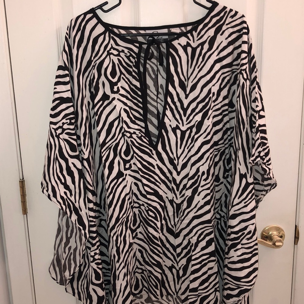 Beautiful zebra stripped swimsuit cover up!